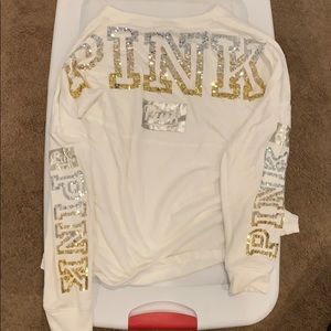 White long sleeve blouse by PINK with sequins.